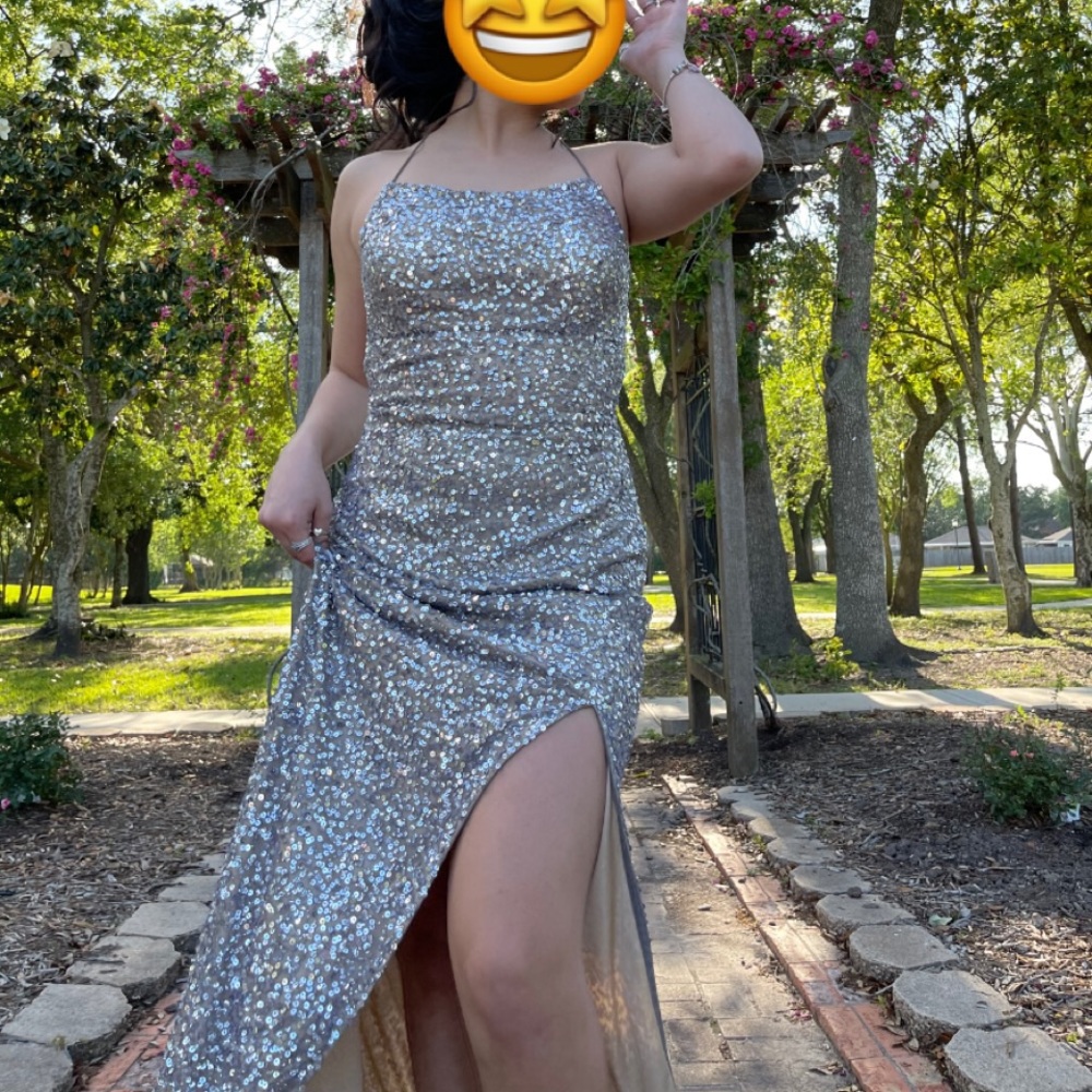 Grey with glitter and has tan color